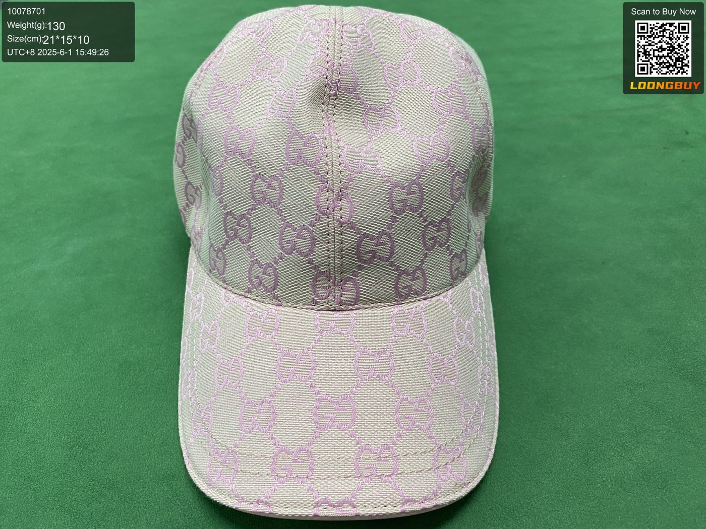 QC photo of a monogram cap with ruler and size panel
