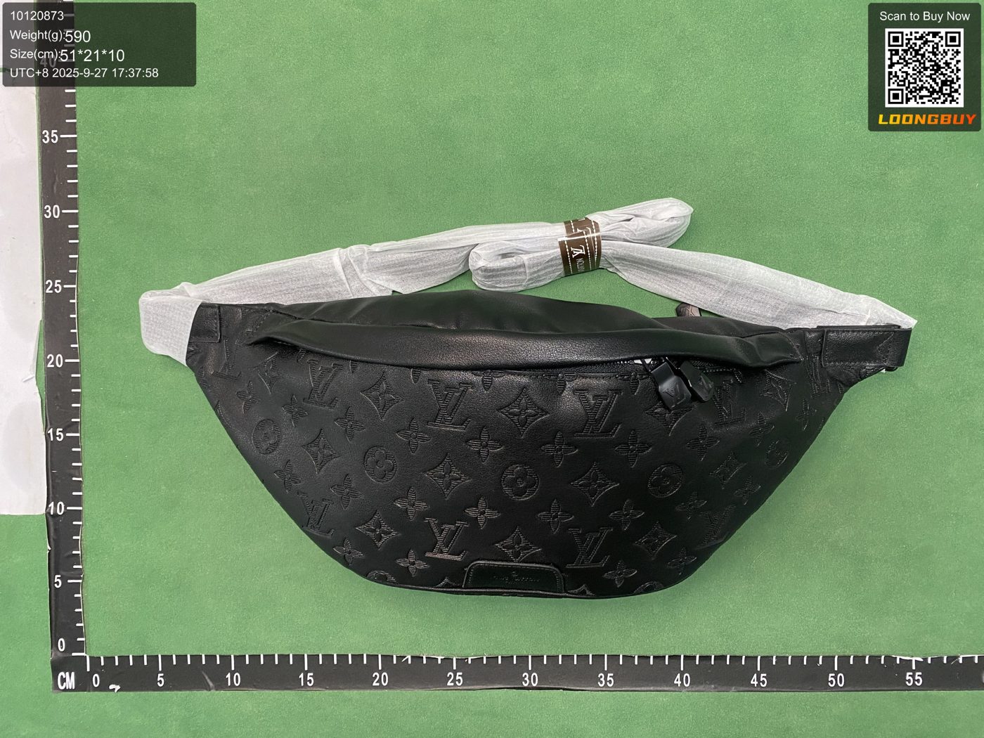 QC photo of a leather waist bag with ruler and size panel